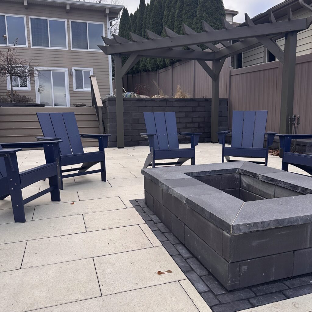 Small triangle shaped pergola stained in black